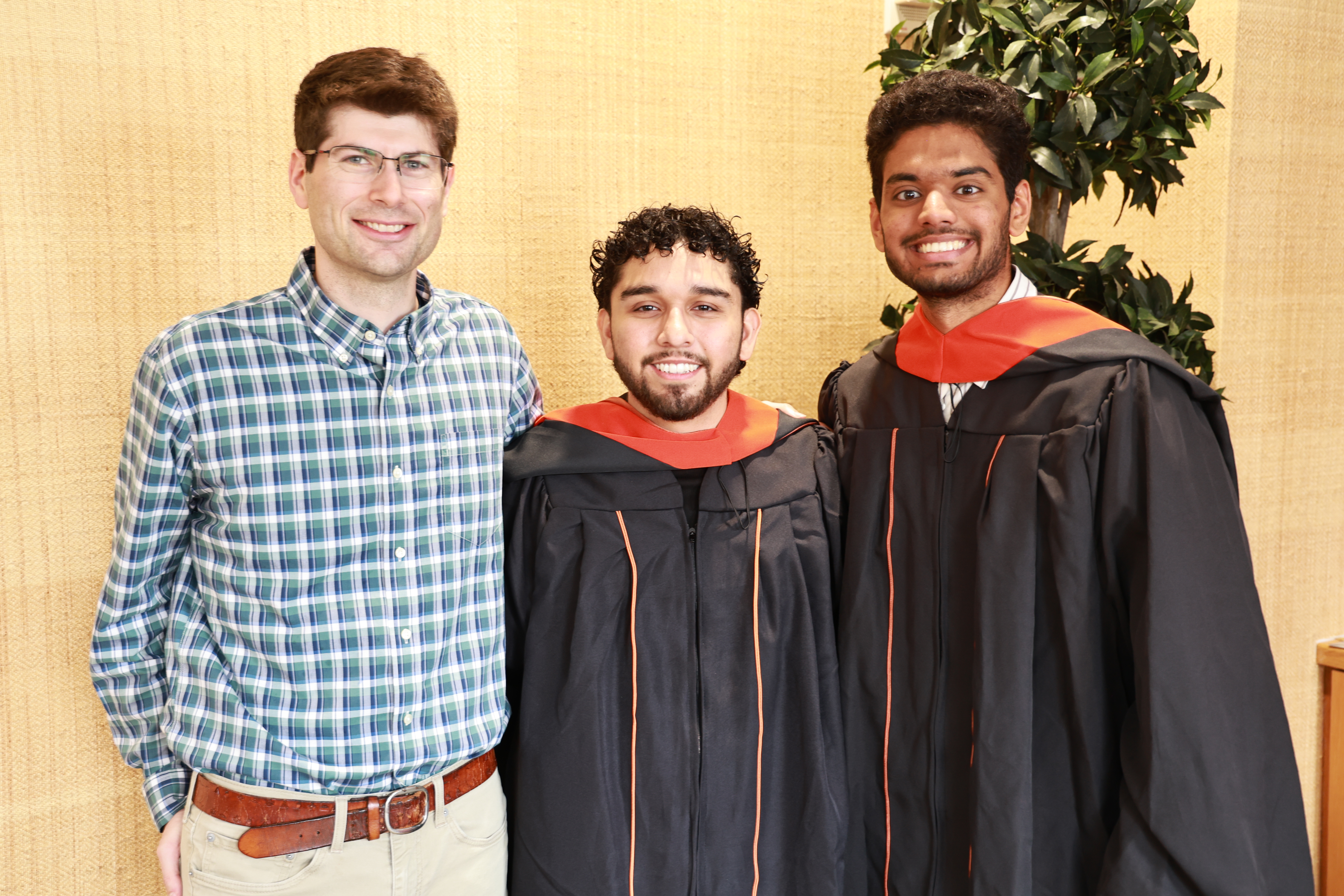Pictured from l-r: David Fridovich-Keil with graduates Antonio Jimenez and Atharva Kalamkar.