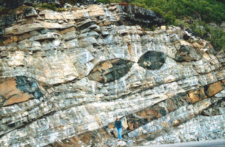 Researchers have published a study suggesting subducting tectonic plates become segmented like a slinky snake, in a process similar to geologic boudinage (pictured) but on a much larger scale. Credit: Haakon Fossen, Cambridge University Press