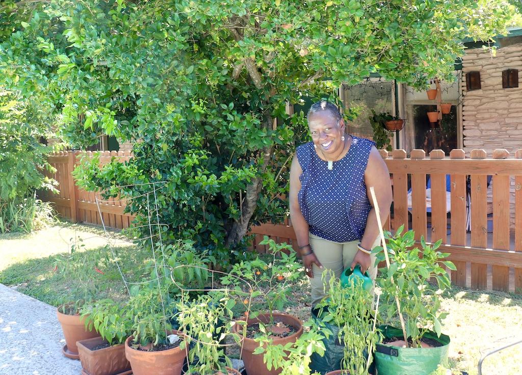 Lisa Gentry in her pepper garden.  